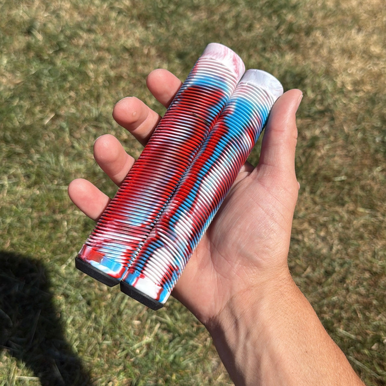 1 Pair of Grips (Red, White, Blue)